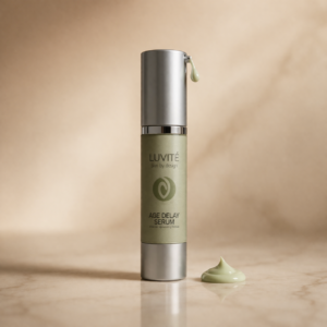 Luvité Age Delay Serum with light green cream serum texture on a neutral luxury background