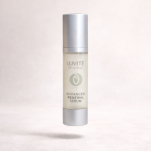 Luvité Advanced Renewal Serum bottle floating on soft neutral background with minimal luxury aesthetic